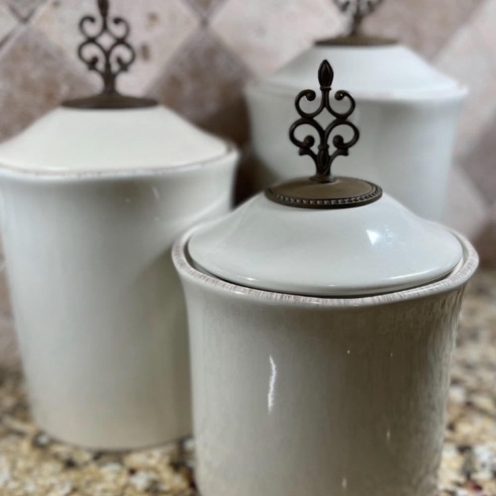 Elegant White Canister Set with Ornate Lids